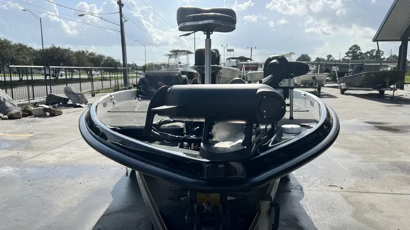 Slide: The Image of 2018 Bass Cat Pantera Classic boat on display under a cloudy sky. - 6