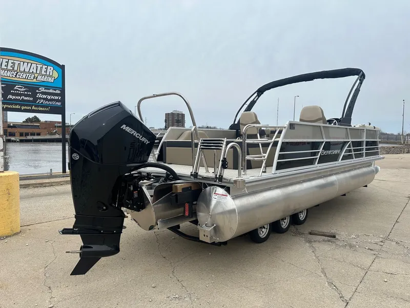 Slide: The Image of 2025 Berkshire CTS Series 24UL pontoon boat at dock. - 11