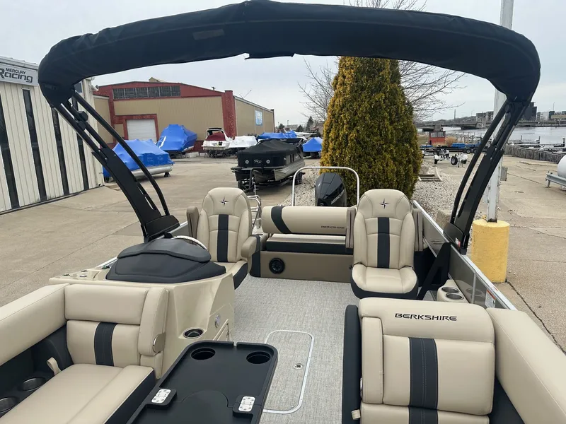 Slide: The Image of 2025 Berkshire CTS Series 24UL pontoon boat at the dock. - 15