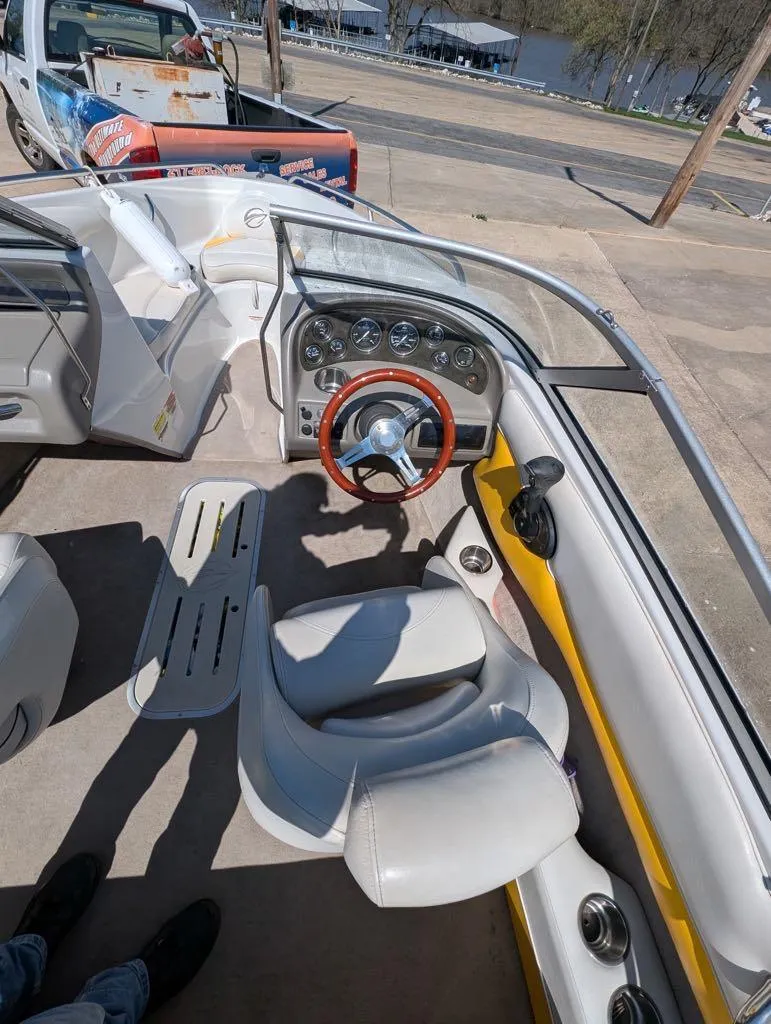Slide: The Image of Interior of a 2006 Crownline 180 BR boat with steering wheel and dashboard. - 5