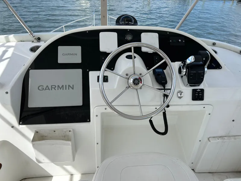 Slide: The Image of Helm of 2006 Beneteau 42 Swift Trawler with Garmin navigation system. - 13