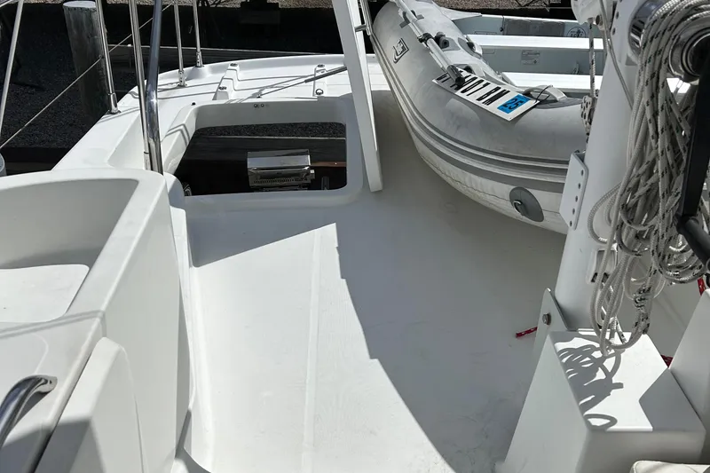 Slide: The Image of Beneteau 42 Swift Trawler 2006 deck with inflatable dinghy and equipment. - 16