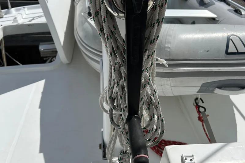 Slide: The Image of Beneteau 42 Swift Trawler 2006 deck with ropes and inflatable boat. - 18