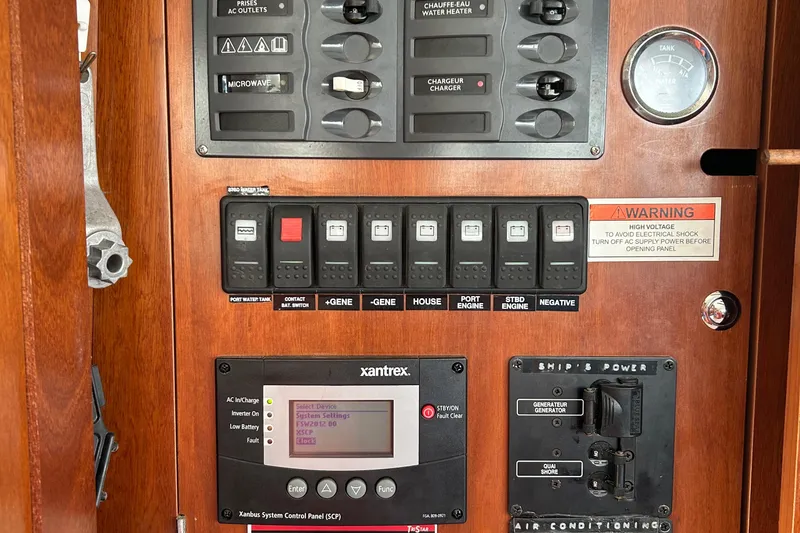 Slide: The Image of Electrical control panel on a 2006 Beneteau 42 Swift Trawler boat. - 22