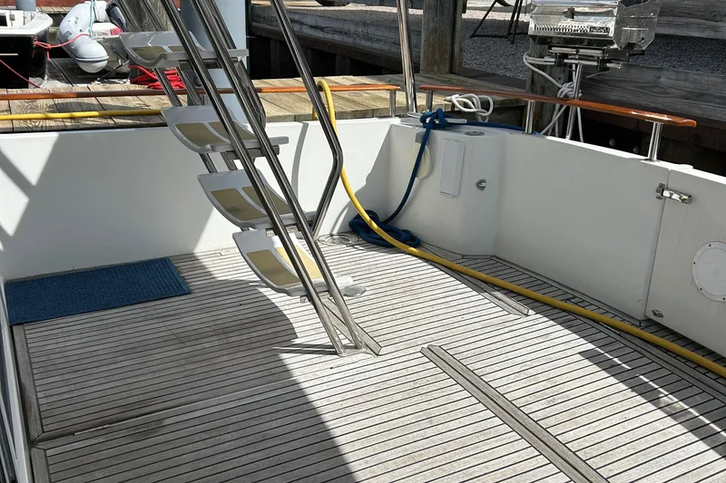 Slide: The Image of Beneteau 42 Swift Trawler 2006 deck with ladder and dock equipment. - 5