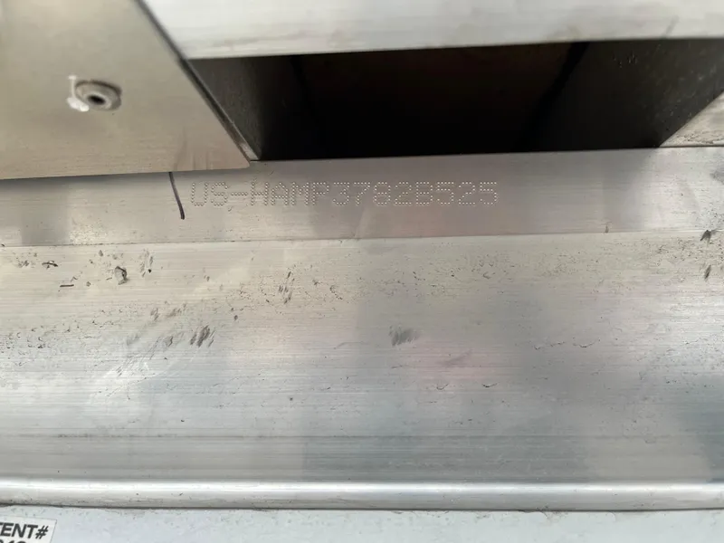 Slide: The Image of Serial number engraving on 2025 Harris Grand Mariner 250 boat. - 19