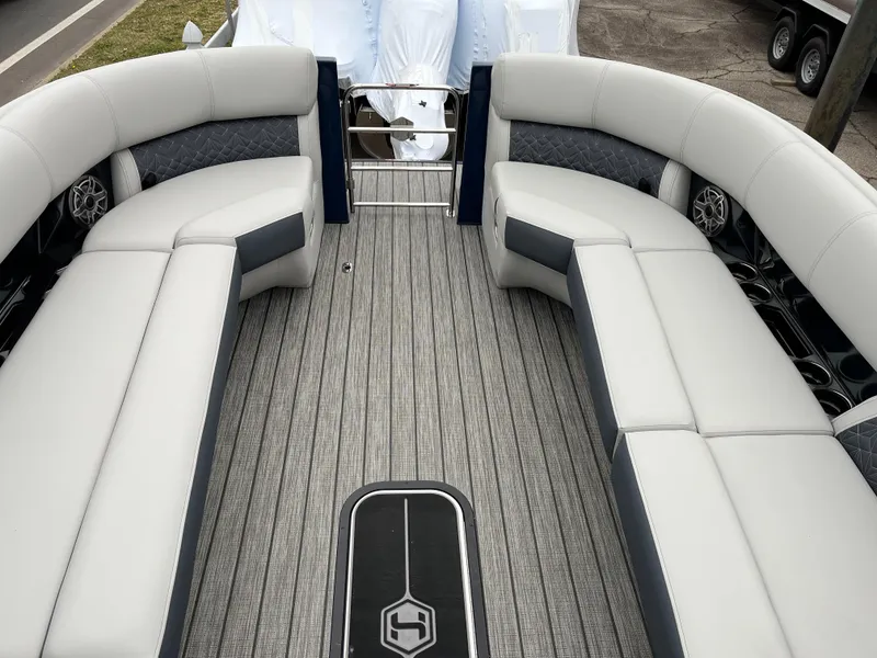 Slide: The Image of 2025 Harris Grand Mariner 250 boat interior with luxurious seating and modern design. - 4
