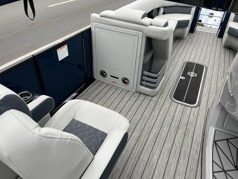 Slide: The Image of 2025 Harris Grand Mariner 250 interior with luxurious seating and sleek flooring design. - 6