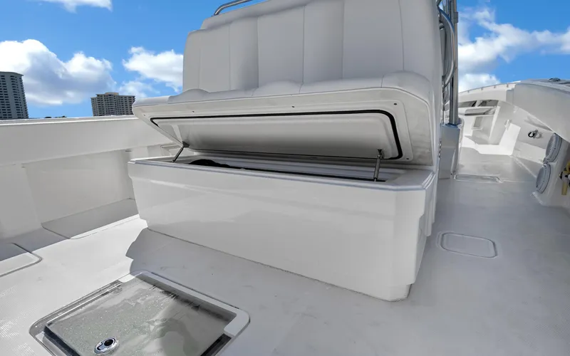 Slide: The Image of 2016 Invincible 39 boat with open storage compartment on deck. - 45