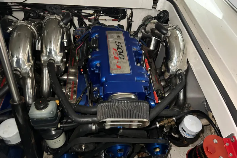 Slide: The Image of Engine of a 2002 Fountain 38 Express Cruiser, showcasing high-performance components. - 31