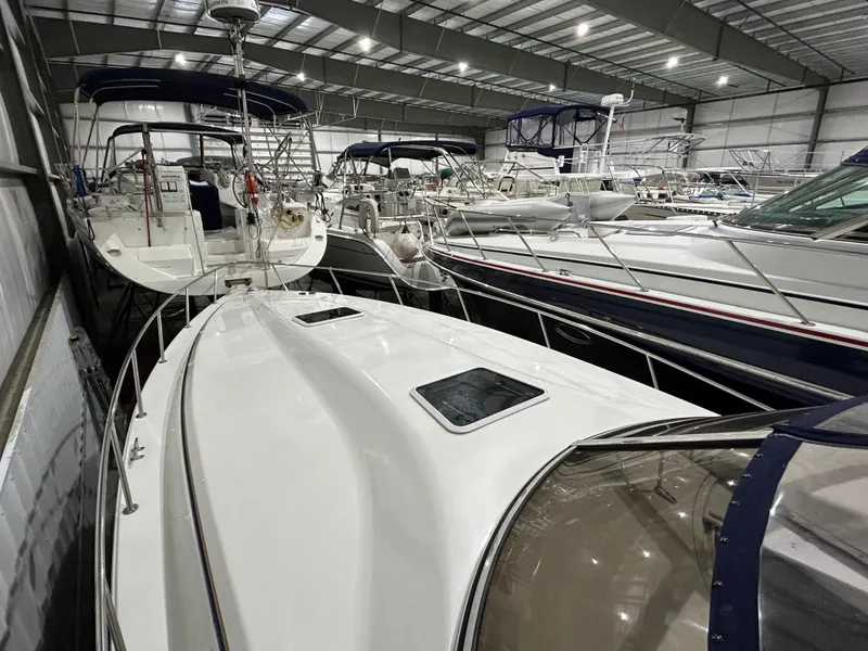 Slide: The Image of 2002 Fountain 38 Express Cruiser in a boat storage facility. - 8