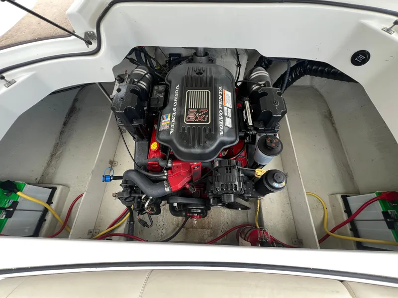Slide: The Image of Engine compartment of a 2009 Cobalt 230 boat with Volvo Penta engine. - 25
