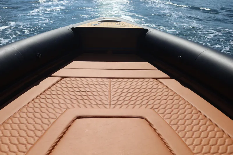 Slide: The Image of Skipper-BSK 38 boat deck, 2025 model, cruising on open water. - 9