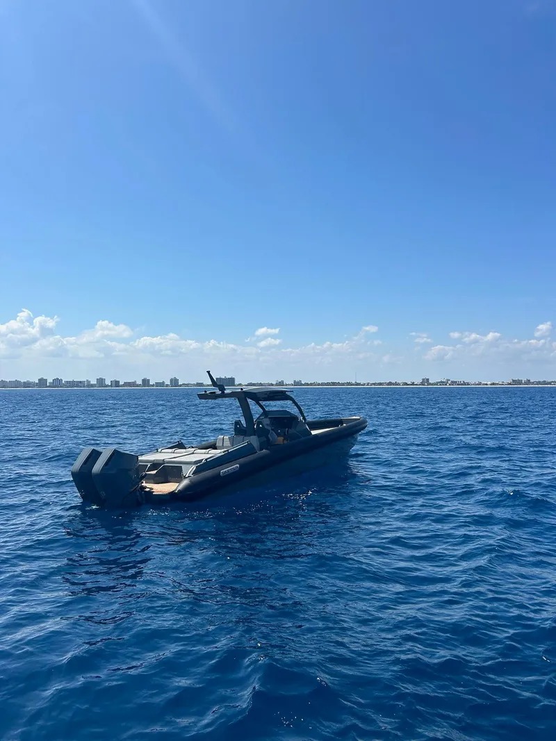 Slide: The Image of 2025 Skipper-BSK 38 boat on open blue sea under clear sky. - 11