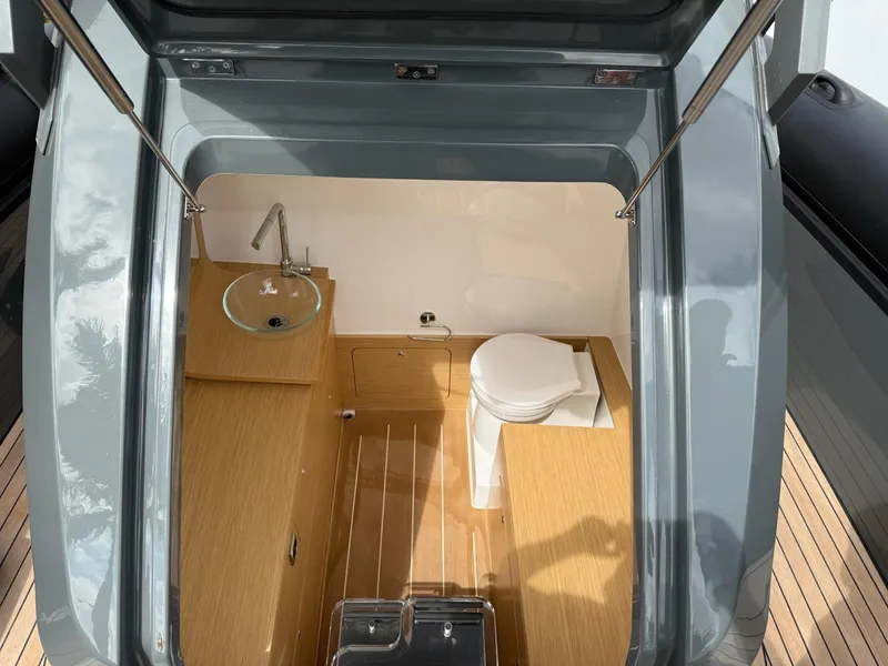 Slide: The Image of Modern boat bathroom with sink and toilet, Skipper-BSK 38, 2025 model. - 23