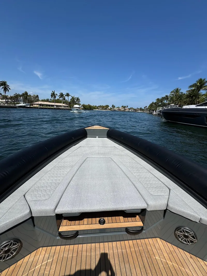 Slide: The Image of Bow view of 2025 Skipper-BSK 38 boat cruising on a sunny day. - 12