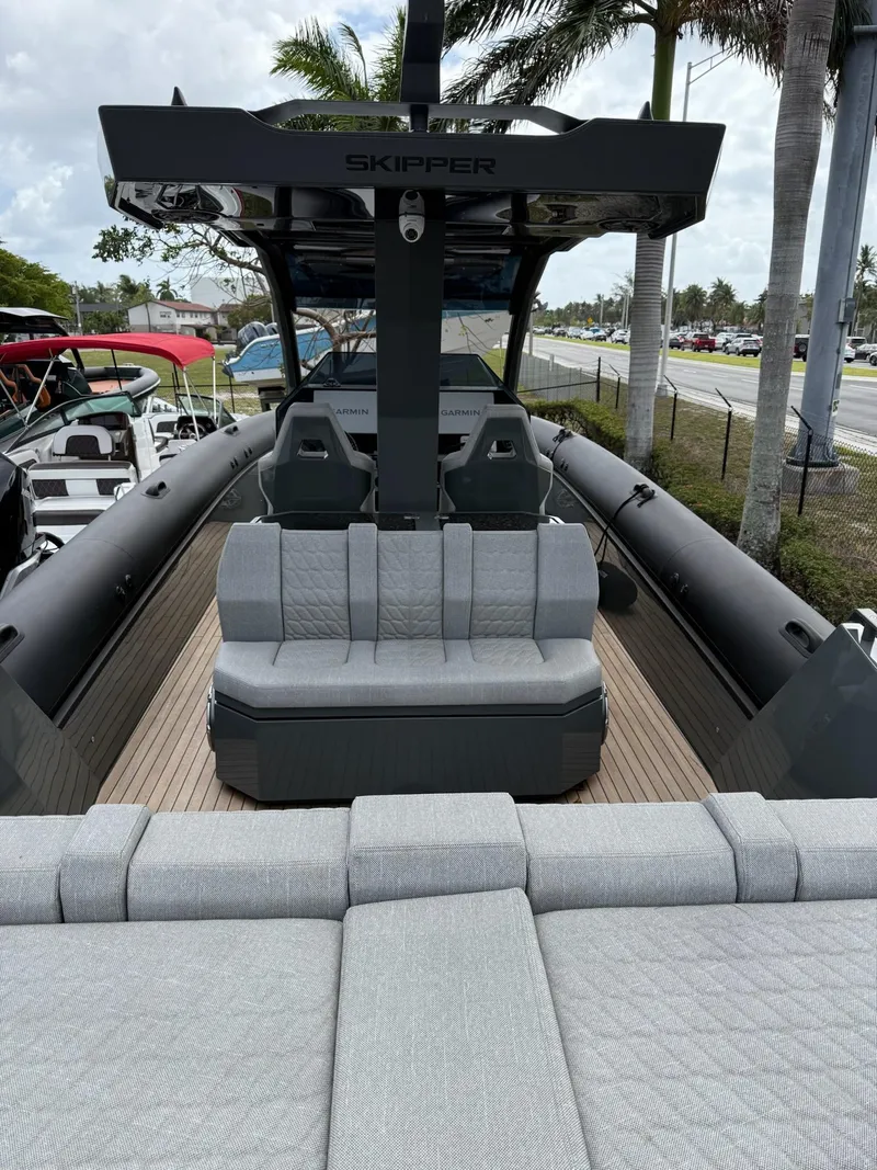 Slide: The Image of 2025 Skipper-BSK 38 boat with sleek design, spacious seating, and modern features. - 29