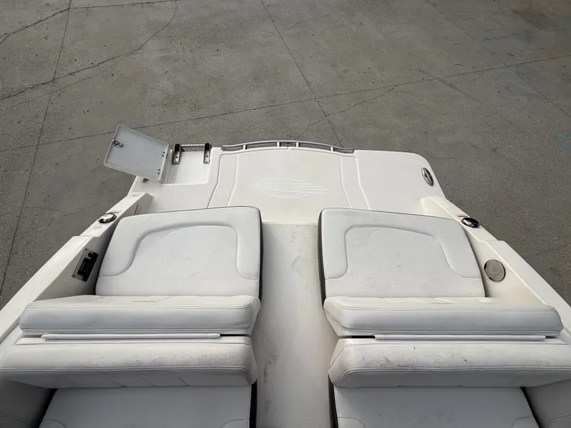 Slide: The Image of 2015 Chaparral 257 SSX boat with white seating and swim platform. - 10