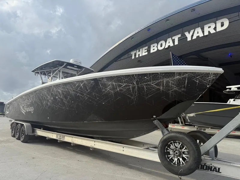 Slide: The Image of 2006 SeaHunter 41 CC Offshore Center Console boat on trailer at The Boat Yard. - 13