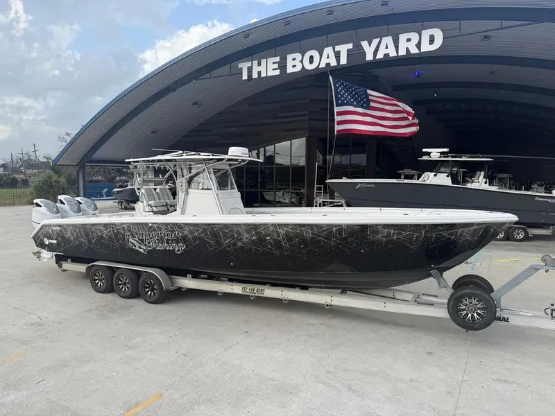 Slide: The Image of 2006 SeaHunter 41 CC Offshore Center Console boat on trailer at The Boat Yard. - 2