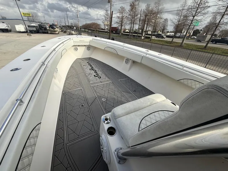 Slide: The Image of 2006 SeaHunter 41 CC Offshore Center Console boat with spacious deck and seating. - 23