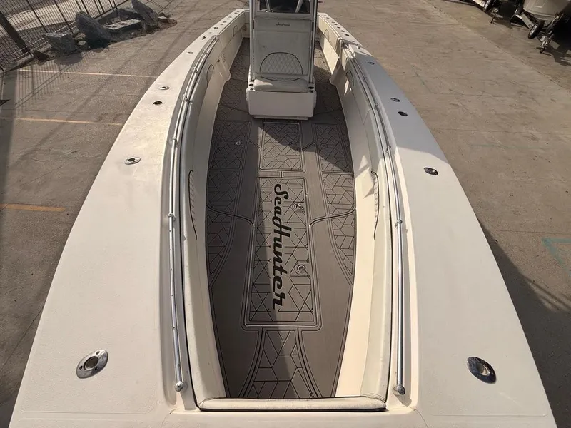 Slide: The Image of 2006 SeaHunter 41 CC Offshore Center Console boat, top view, spacious deck, sleek design. - 27