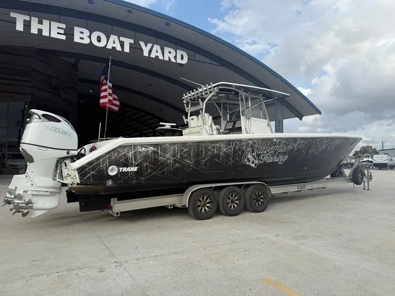 Slide: The Image of 2006 SeaHunter 41 CC Offshore Center Console boat on trailer at The Boat Yard. - 3