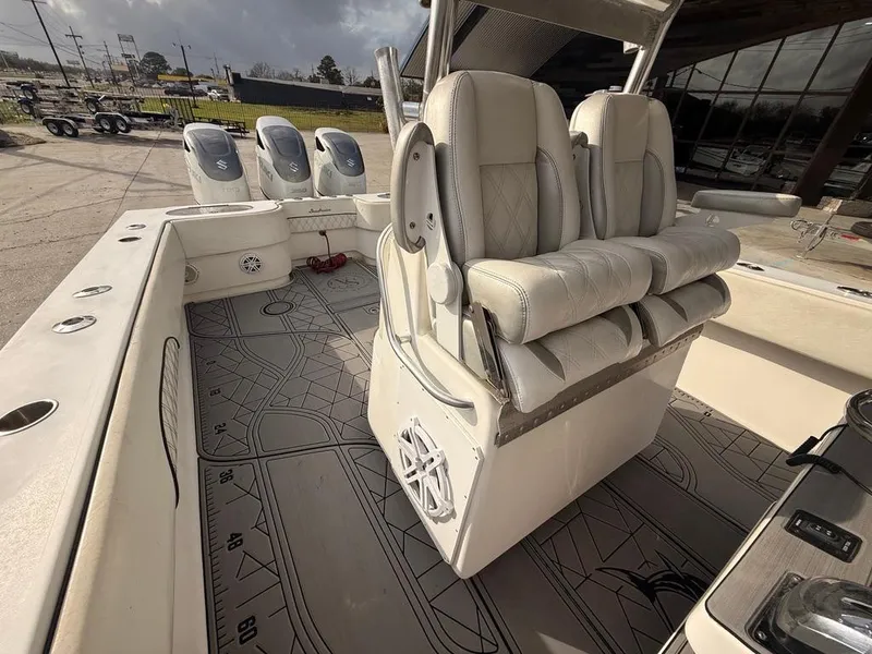 Slide: The Image of 2006 SeaHunter 41 CC Offshore Center Console with luxurious seating and spacious deck layout. - 30