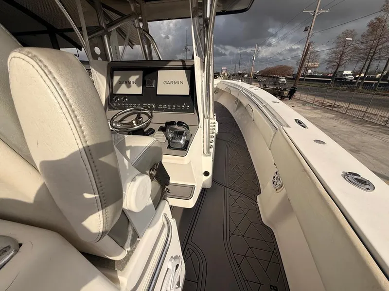 Slide: The Image of 2006 SeaHunter 41 CC Offshore Center Console with Garmin displays and spacious deck. - 31