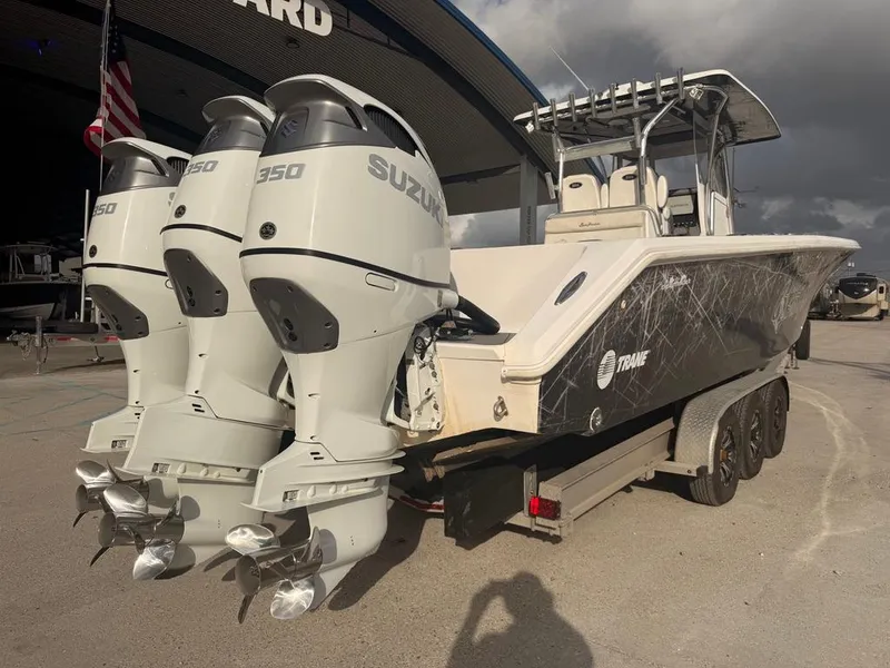 Slide: The Image of 2006 SeaHunter 41 CC Offshore Center Console with twin Suzuki 350 engines on trailer. - 6
