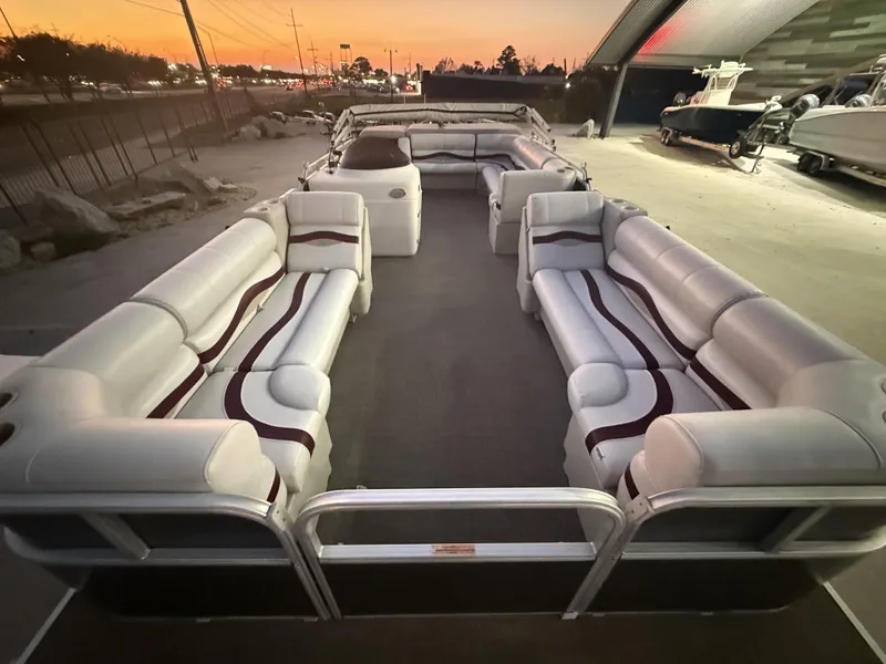Slide: The Image of 2008 South Bay 25 pontoon boat with spacious seating at sunset. - 6