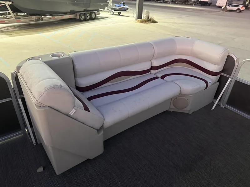 Slide: The Image of Beige and maroon boat seating on a 2008 South Bay 25 pontoon. - 7