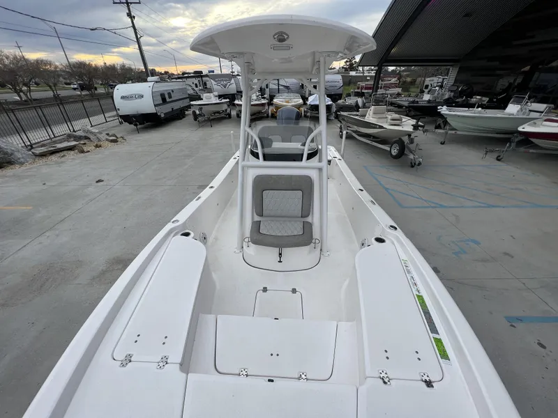 Slide: The Image of 2020 Sea Fox 240 Viper boat displayed in a marina with other vessels. - 9