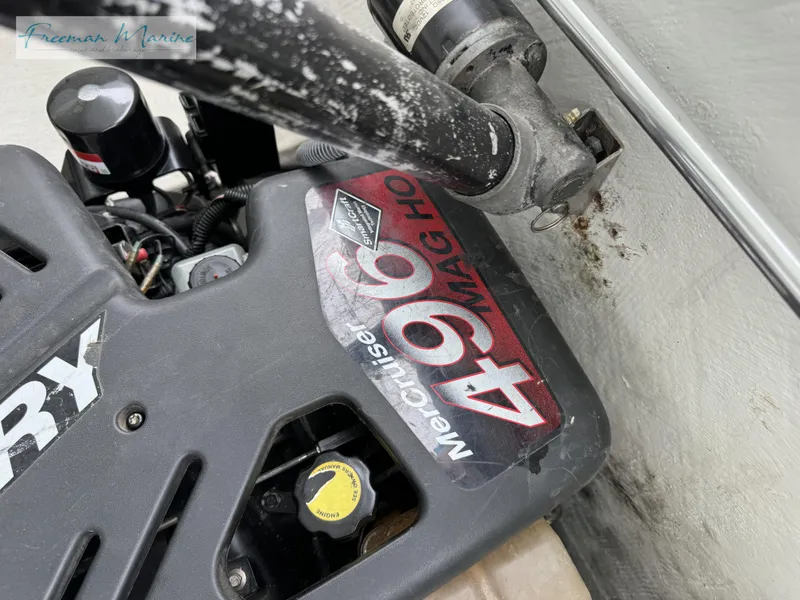 Slide: The Image of Close-up of a 2002 Baja 292 Islander engine, featuring MerCruiser 496 MAG HO. - 30