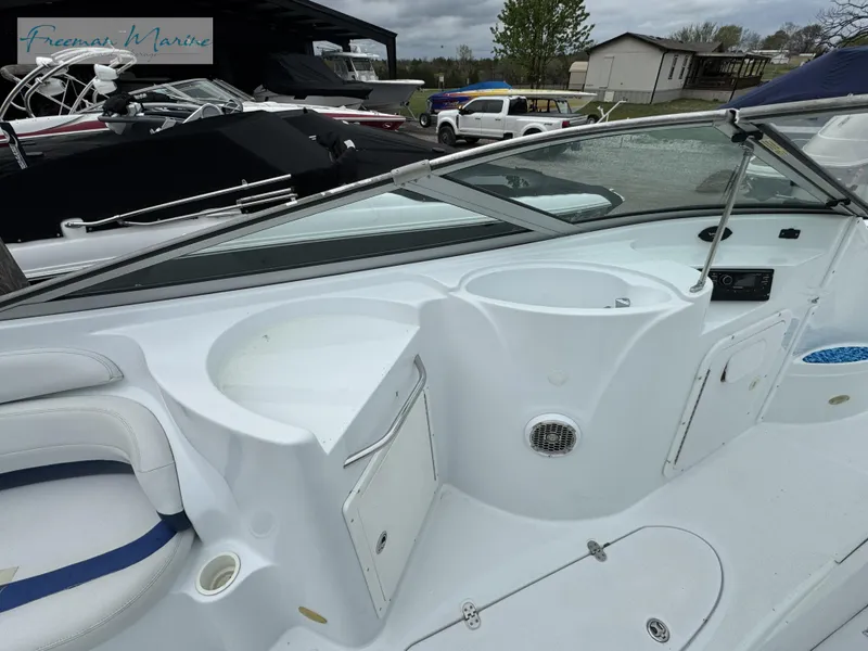 Slide: The Image of 2002 Baja 292 Islander boat interior with seating and storage compartments. - 9