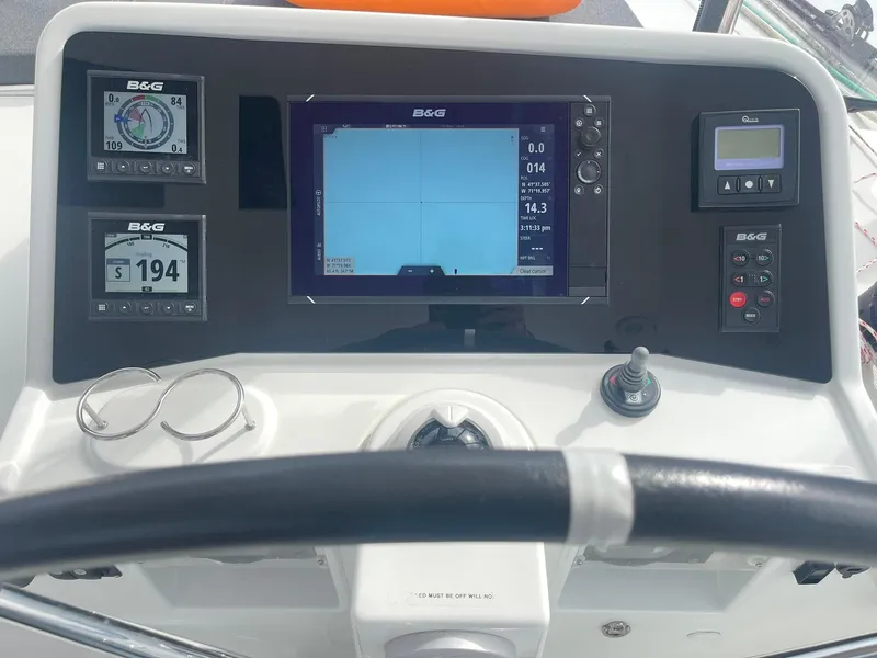Slide: The Image of Control panel of a 2019 Lagoon 450 F catamaran with B&G navigation displays. - 35