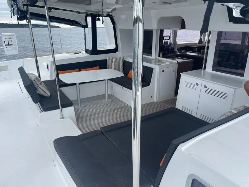 Slide: The Image of Spacious 2019 Lagoon 450 F catamaran interior with seating and dining area. - 41