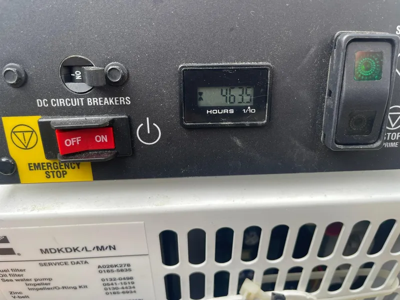 Slide: The Image of Control panel of a 2019 Lagoon 450 F with hour meter reading 467.5. - 46