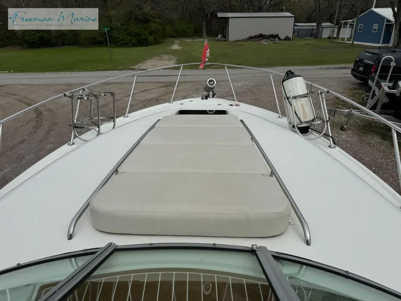 Slide: The Image of 2008 Chaparral Signature 290 boat deck with sunpad and railing, docked at Freeman Marina. - 20