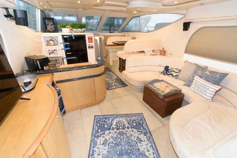 Slide: The Image of Luxurious interior of 2001 Maxum 4100 SCB yacht with elegant seating and decor. - 11