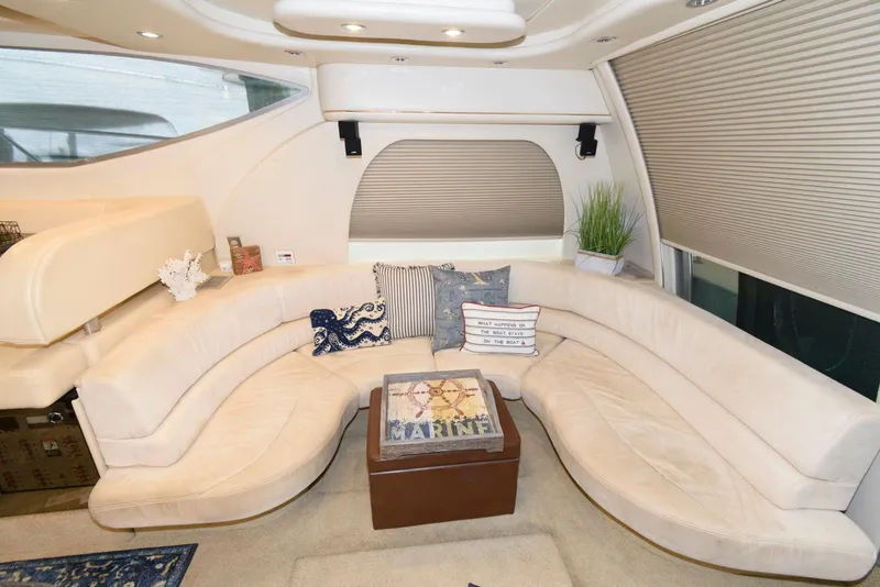 Slide: The Image of Luxurious interior of 2001 Maxum 4100 SCB yacht with plush seating and decor. - 13
