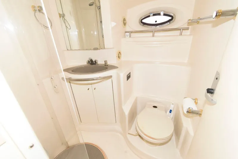 Slide: The Image of Bathroom of 2001 Maxum 4100 SCB yacht with sink, toilet, and shower. - 20