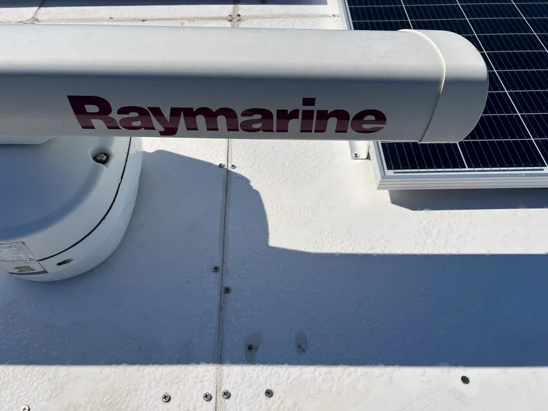 Slide: The Image of Raymarine equipment on 1983 Lindmark 39 Trawler with solar panel in sunlight. - 20