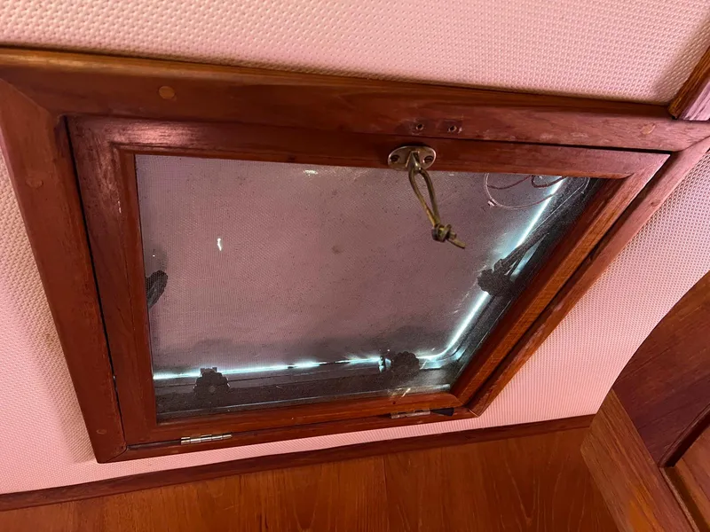Slide: The Image of Wooden framed hatch on 1983 Lindmark 39 Trawler boat interior. - 37