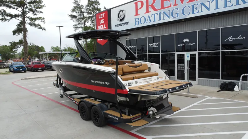 Slide: The Image of 2022 Chaparral 28 Surf boat on trailer at Premier Boating Center. - 7