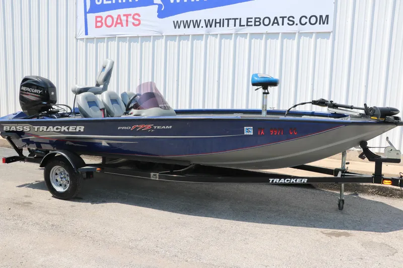 Slide: The Image of 2014 Bass Tracker PT175TF boat on trailer, displayed at Whittle Boats dealership. - 10