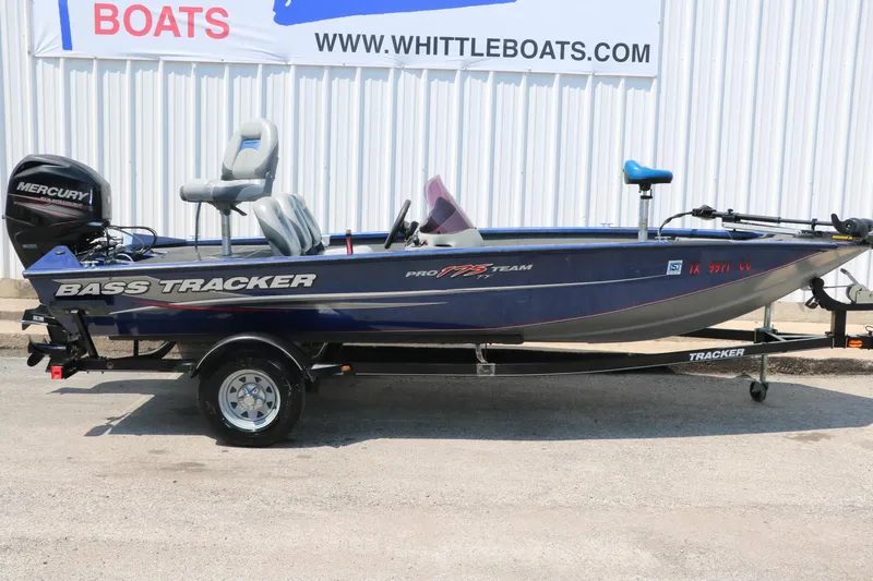 Slide: The Image of 2014 Bass Tracker PT175TF boat with Mercury engine on trailer, parked outside Whittle Boats. - 11