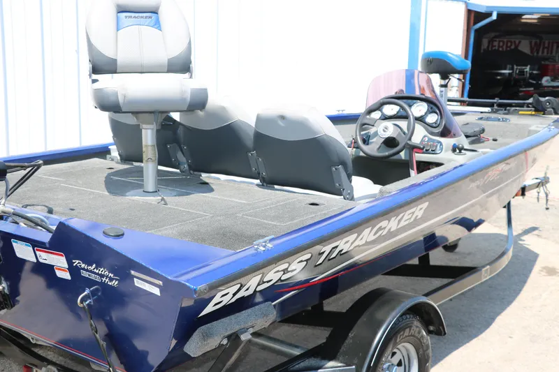 Slide: The Image of 2014 Bass Tracker PT175TF fishing boat with dual seats and steering console. - 14