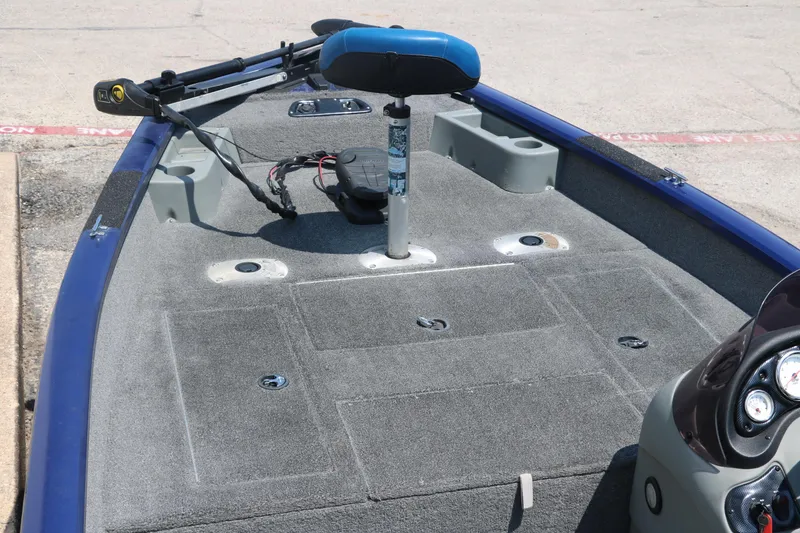 Slide: The Image of 2014 Bass Tracker PT175TF boat deck with seating and equipment. - 16