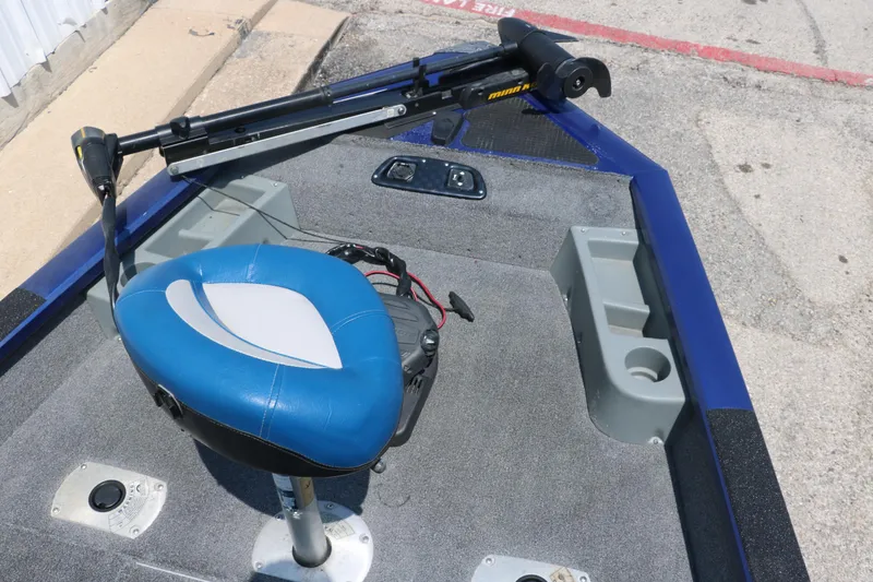 Slide: The Image of 2014 Bass Tracker PT175TF boat deck with blue seat and trolling motor. - 18